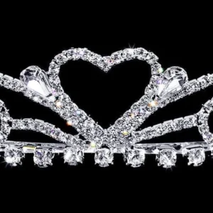 A tiara with a heart shaped diamond on it.