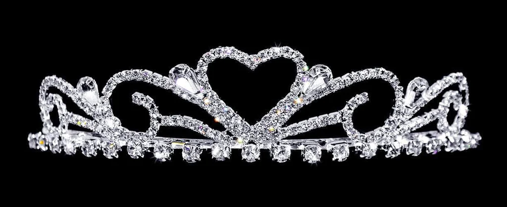 A tiara with a heart shaped diamond on it.