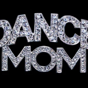 A close up of the words dance mom