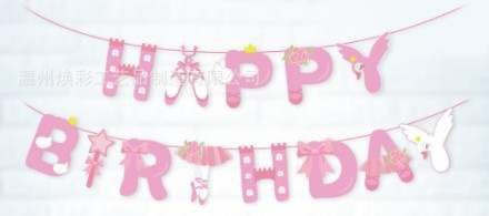 A pink banner that says happy birthday with shoes and umbrellas.