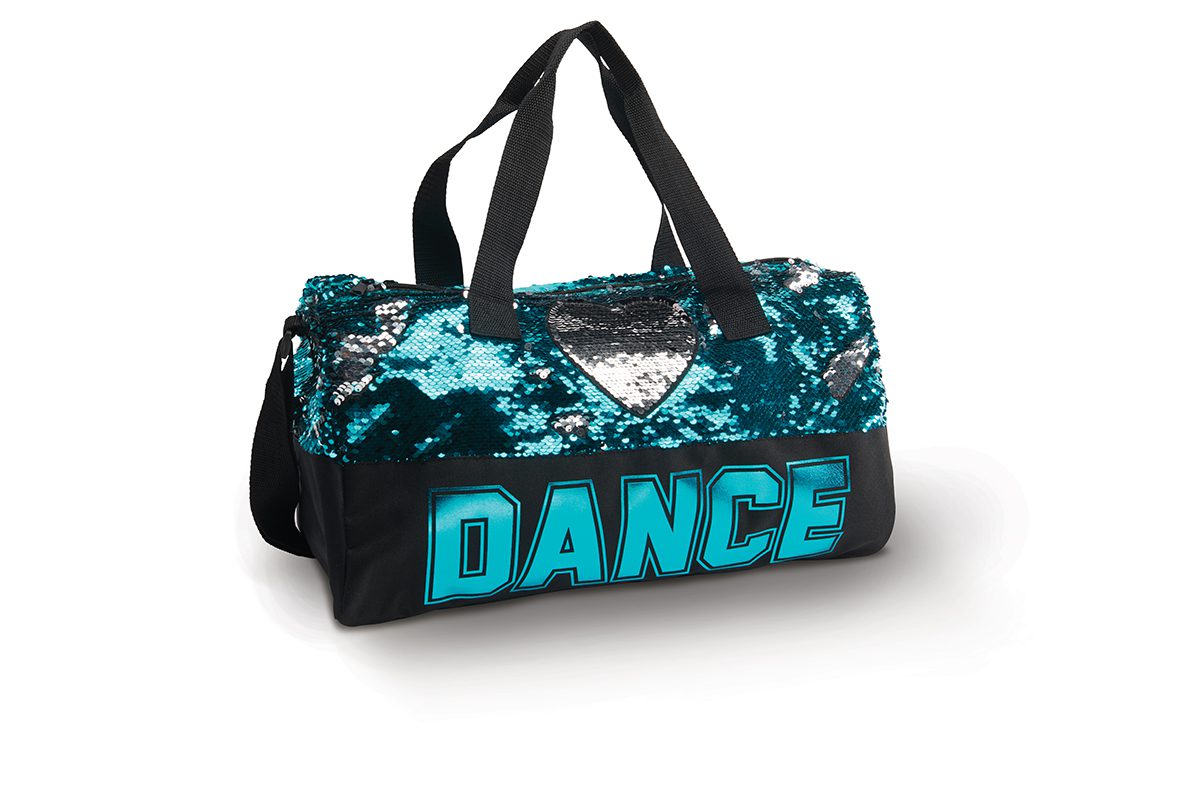 A blue duffel bag with the word " dance " on it.