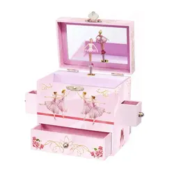 A pink musical jewelry box with two drawers and a mirror.