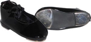 A pair of black shoes with silver soles.