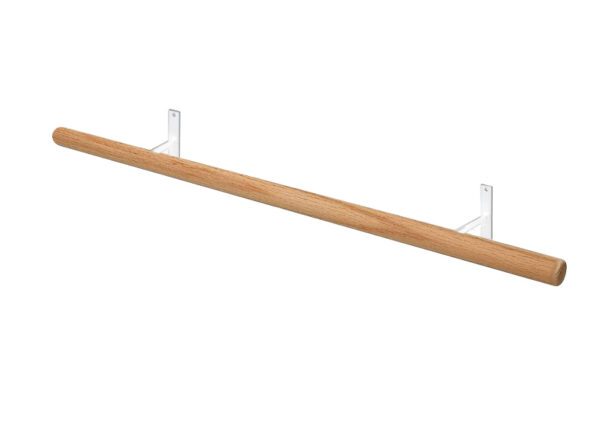 A wooden pole with two white metal brackets.
