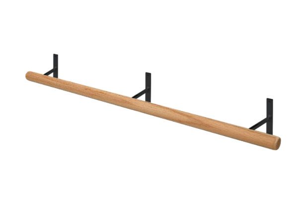A wooden shelf with metal brackets on top of it.