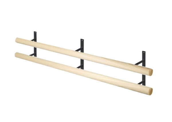 A pair of poles with black metal brackets on top.