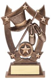 A bronze trophy with shoes, hat and stars.