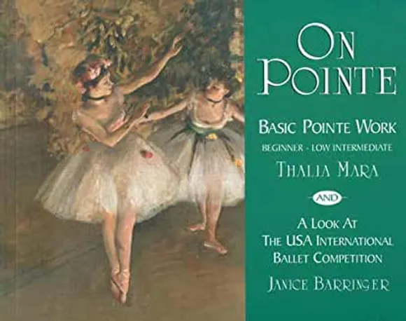 A book cover with two ballerinas in the background.