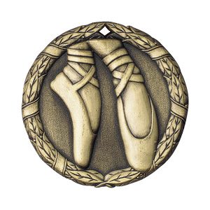 A medal with two pairs of ballet shoes on it.