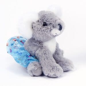 A plush gray koala toy holding a blue patterned object.