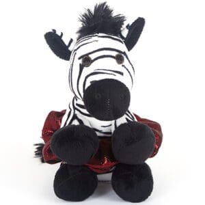 A small plush zebra toy wearing a red outfit.