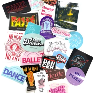 Collection of colorful dance-themed stickers and patches.