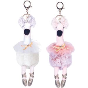 Two ballerina-themed keychains in white and pink tutus with gold shoes.