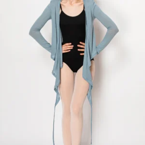 Woman modeling a black bodysuit with a long, light gray cardigan.