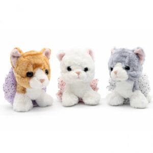 Three cute plush cat toys in different colors sitting side by side.