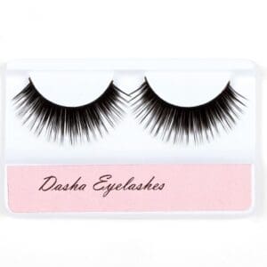 A pair of dramatic, voluminous false eyelashes in white packaging.